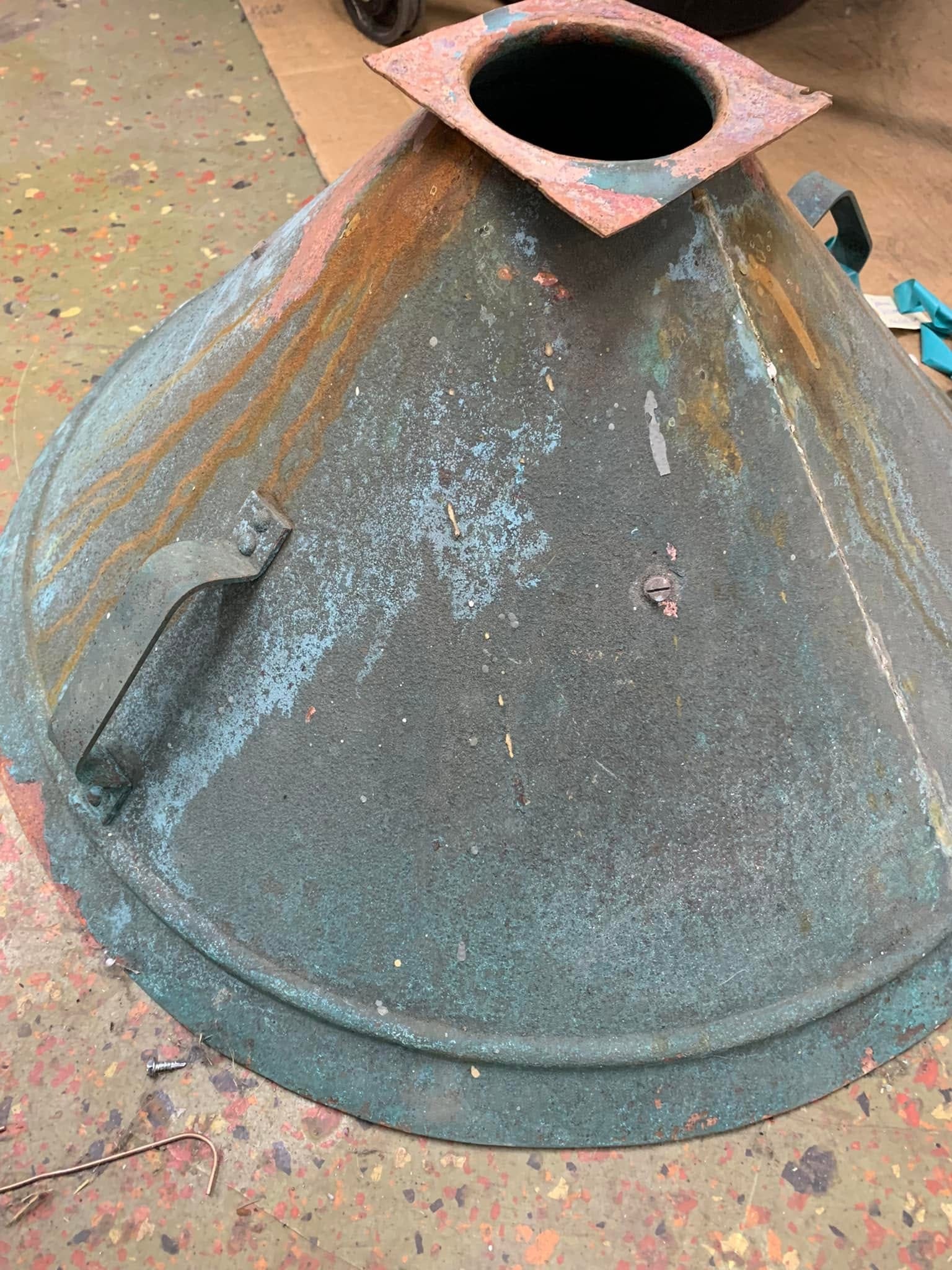 Oxiderad konformad detalj före behandling